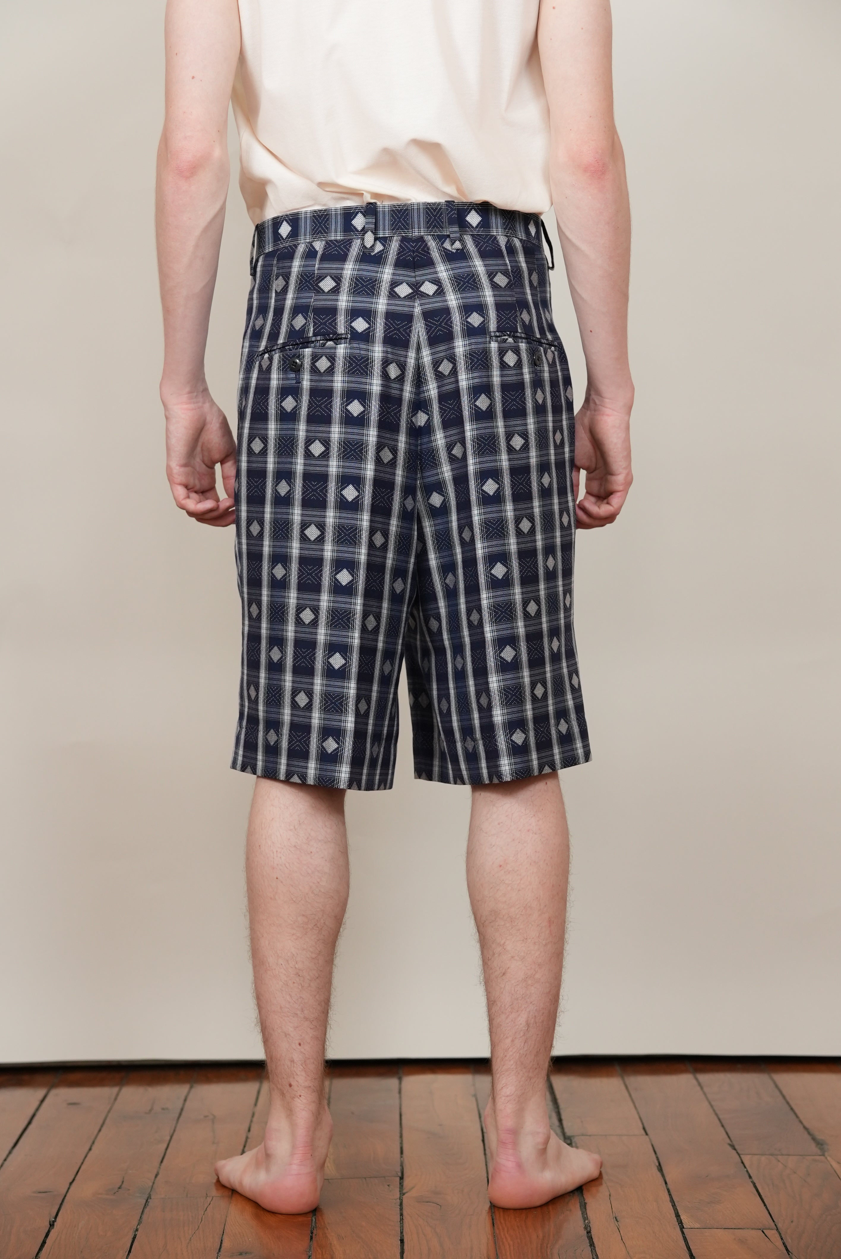 TUCKED DRESS SHORTS check jacquard navy/brown